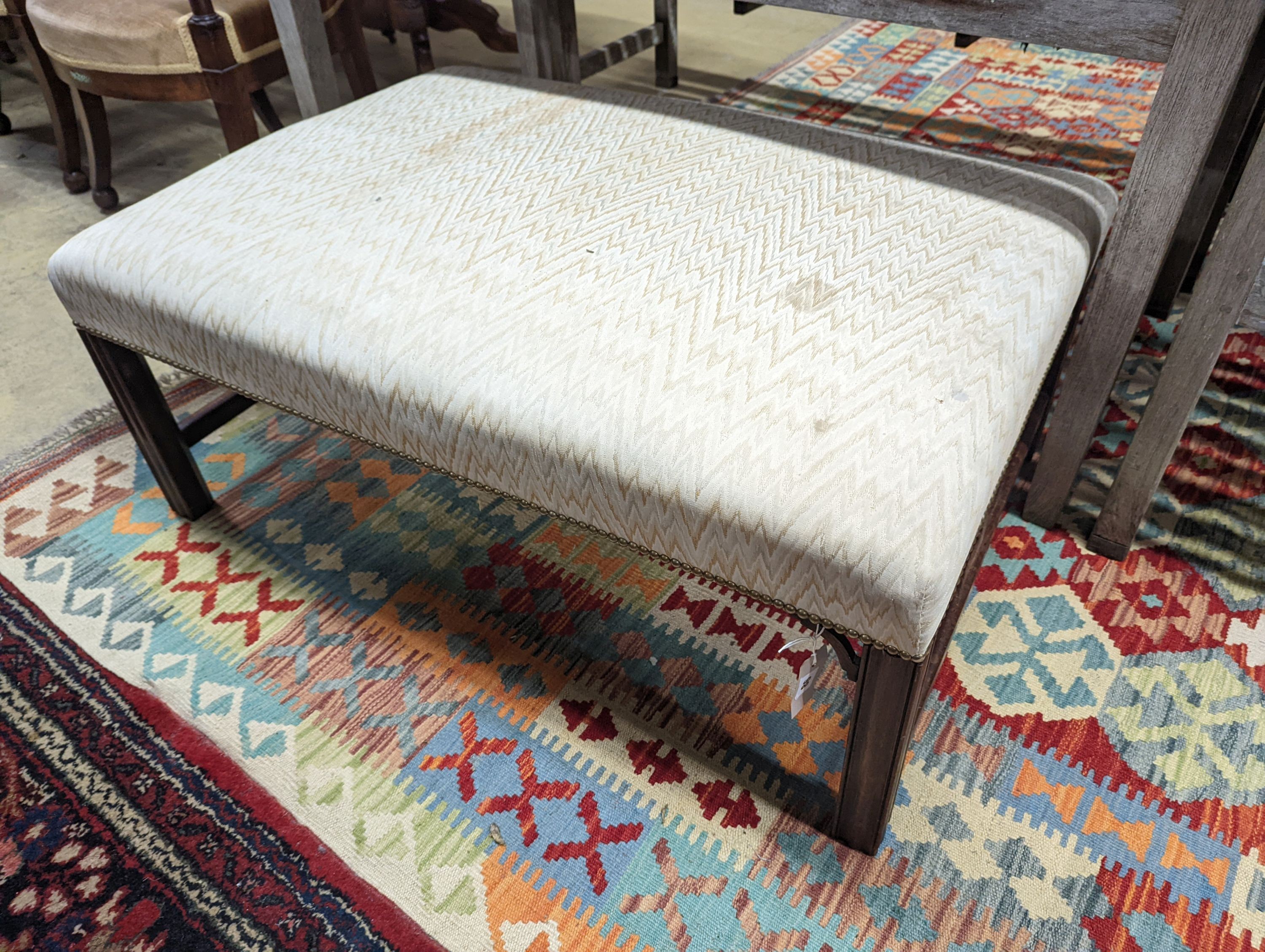A George III style rectangular upholstered footstool, width 103cm, depth 72cm, height 41cm
